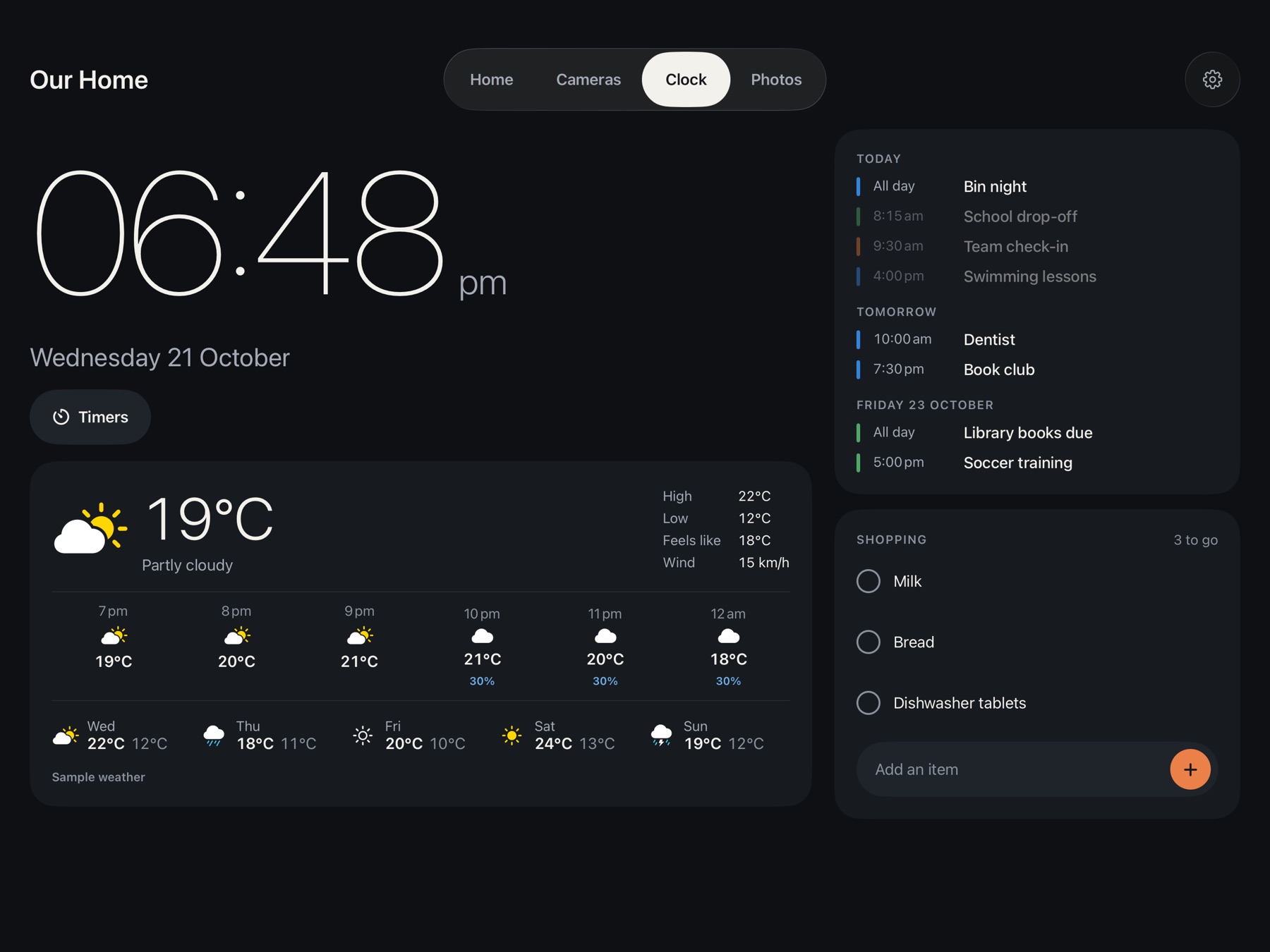 Clock face with weather, calendar and a shopping list.